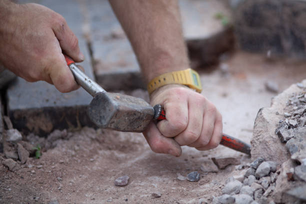 How to Break Concrete With Hand Tools